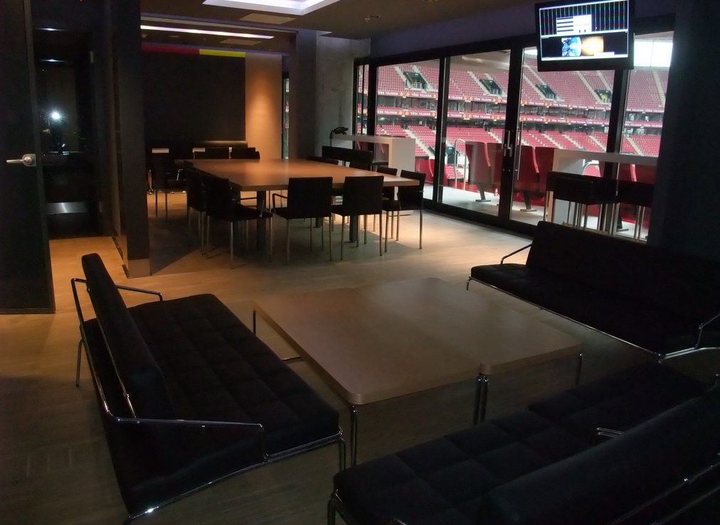 Interior of a professional suite or event hall. Atmosphere. Illustrative — not a TASG facility.